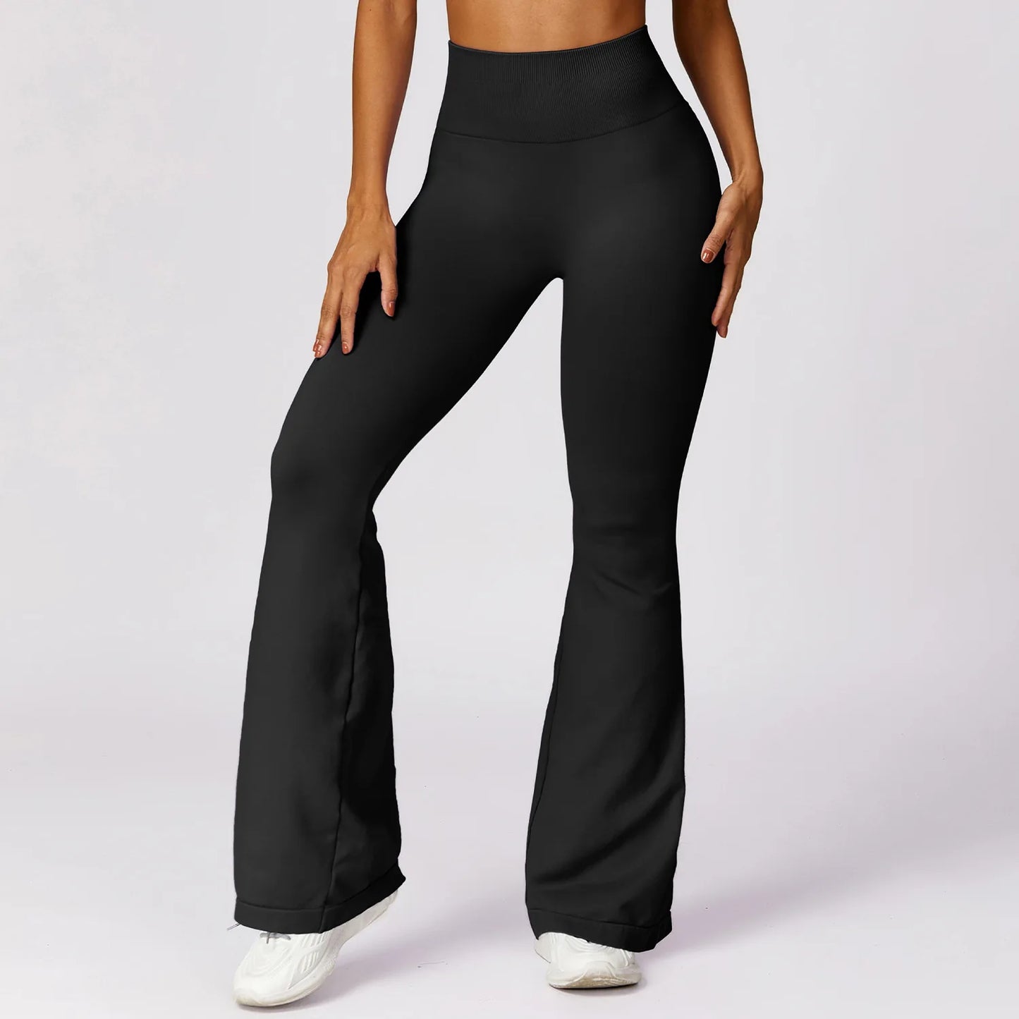 Flare leggings – sømløse yoga-bukser med høyt liv, brede ben og perfekt for trening eller casual bruk.